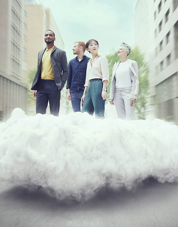 Four people commuting through a city on a flying cloud